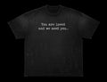 You are loved and we need you distressed black tee front
