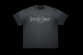 Seventh Street West Oakland distressed charcoal tee with off-white serif text on black background
